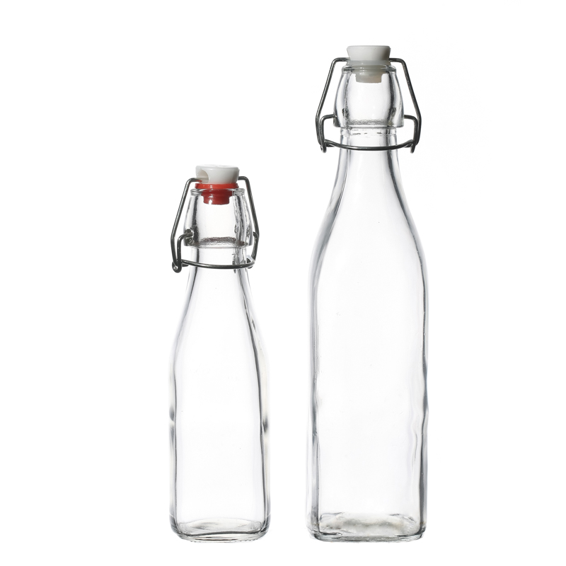 Bouteilles de boisson en verre en gros 250 ml bouteilles de lait d'eau avec couvercles swing
