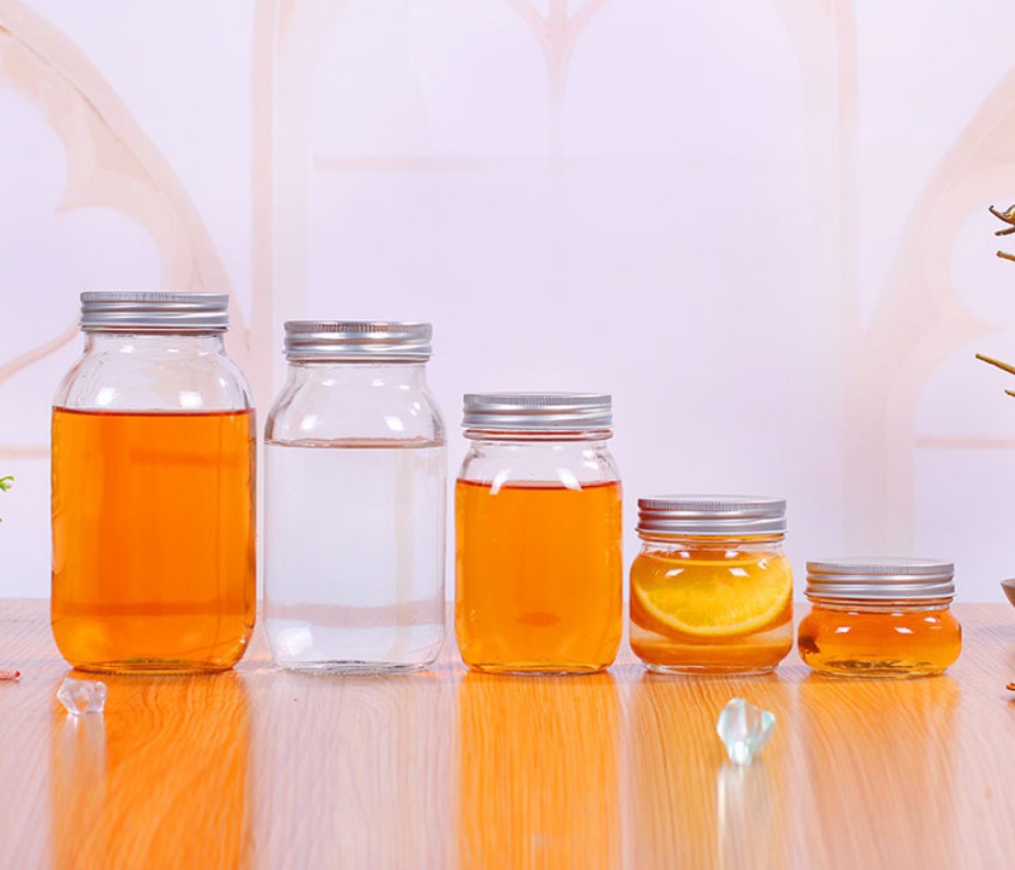 Bouteilles en verre personnalisées de verre de miel personnalisé 150 ml 300 ml 500 ml 750 ml JAR MASON Emballage Conteneur chinois fabricants