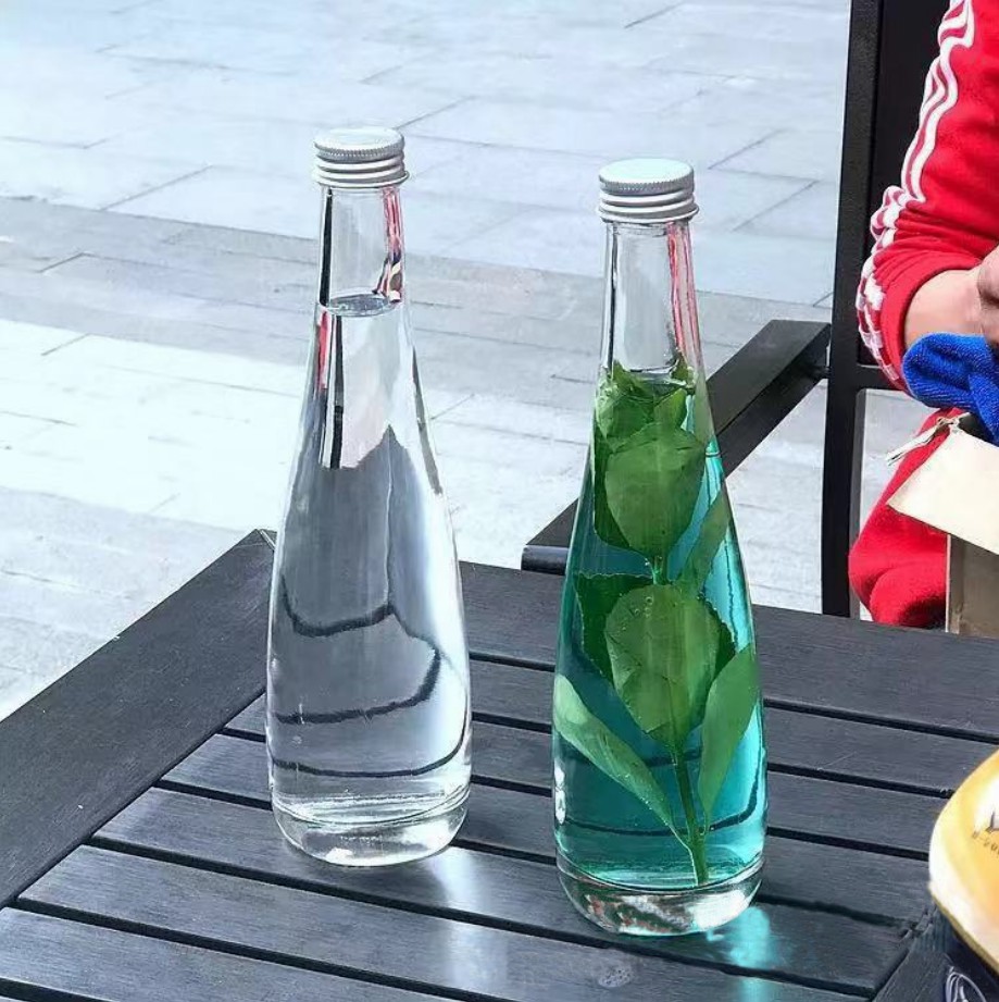 Emballage en verre à jus populaire personnalisé de haute qualité 500 ml 330 ml bouteille en verre vide bouteilles d'eau minérale