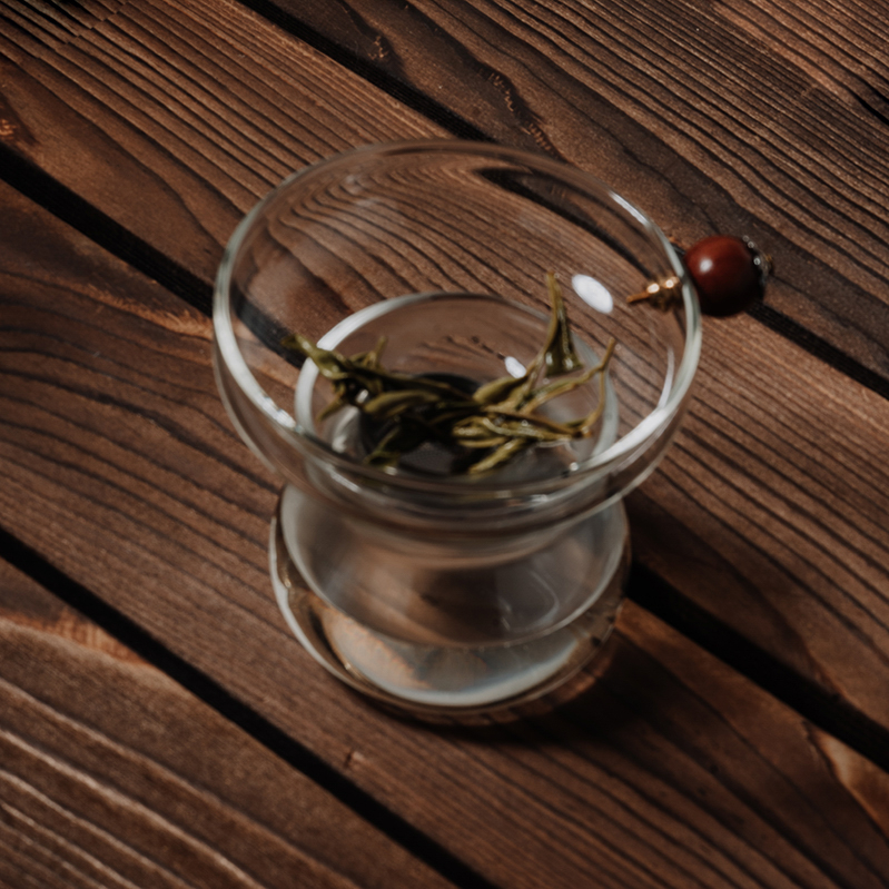 Casque à thé en verre transparente